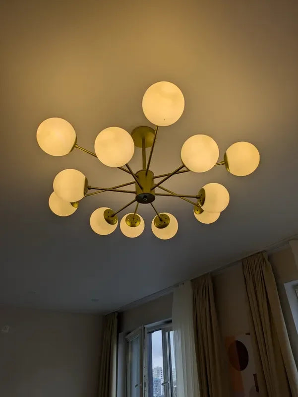 Suspension boule en verre et barres en métal design moderne