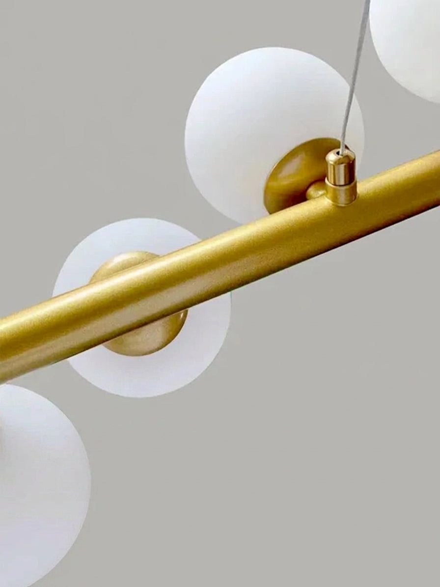 Suspension avec boule en verre et barre linéaire design moderne